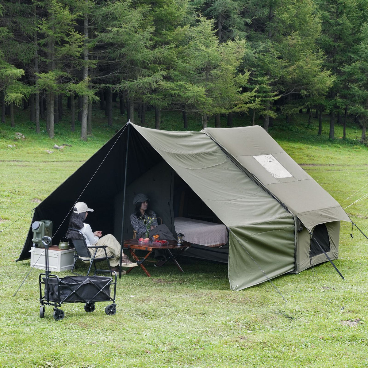Green inflatable tent, supplied with a carry bag.
