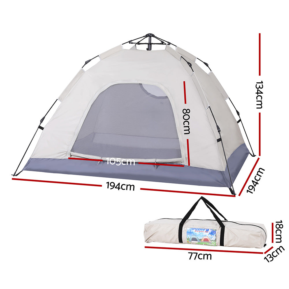 Beige pop up tents, supplied with a carry bag.