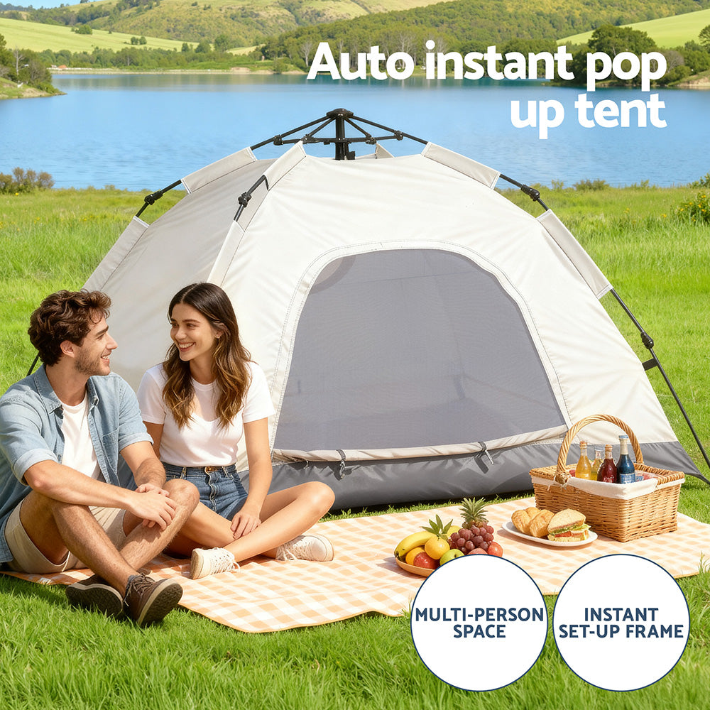 Beige pop up tents, supplied with a carry bag.