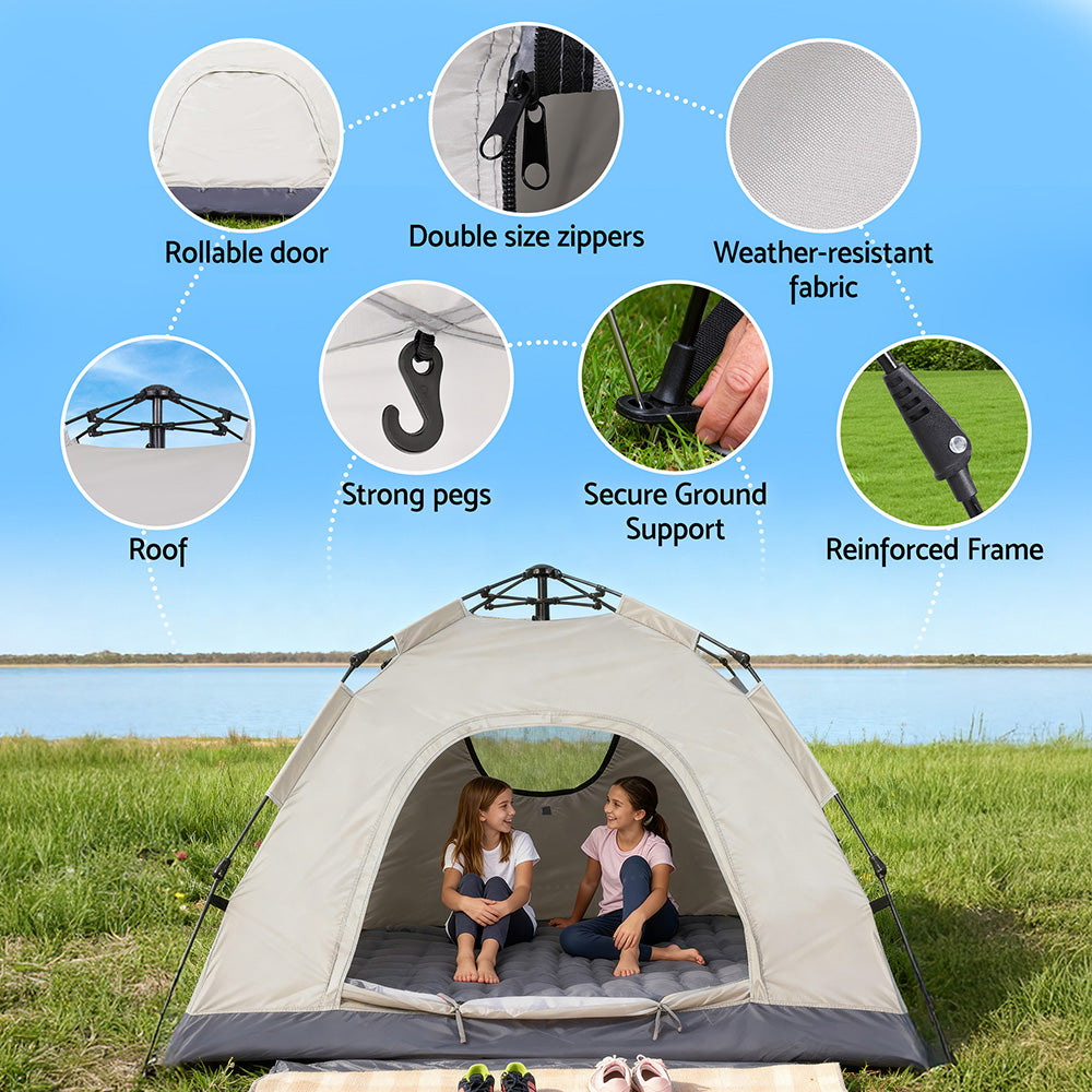 Beige pop up tents, supplied with a carry bag.