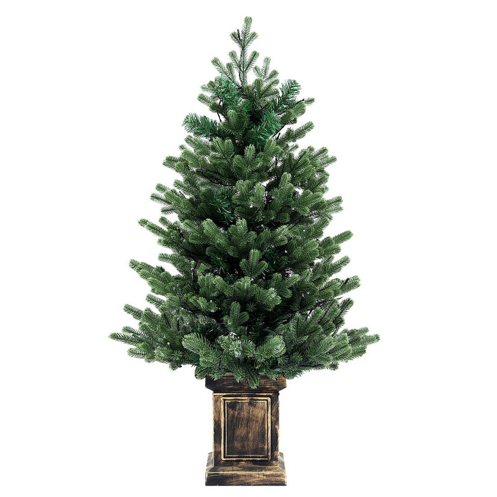 Potted Christmas tree 1.2 metres tall with LED lights and eight lighting modes.