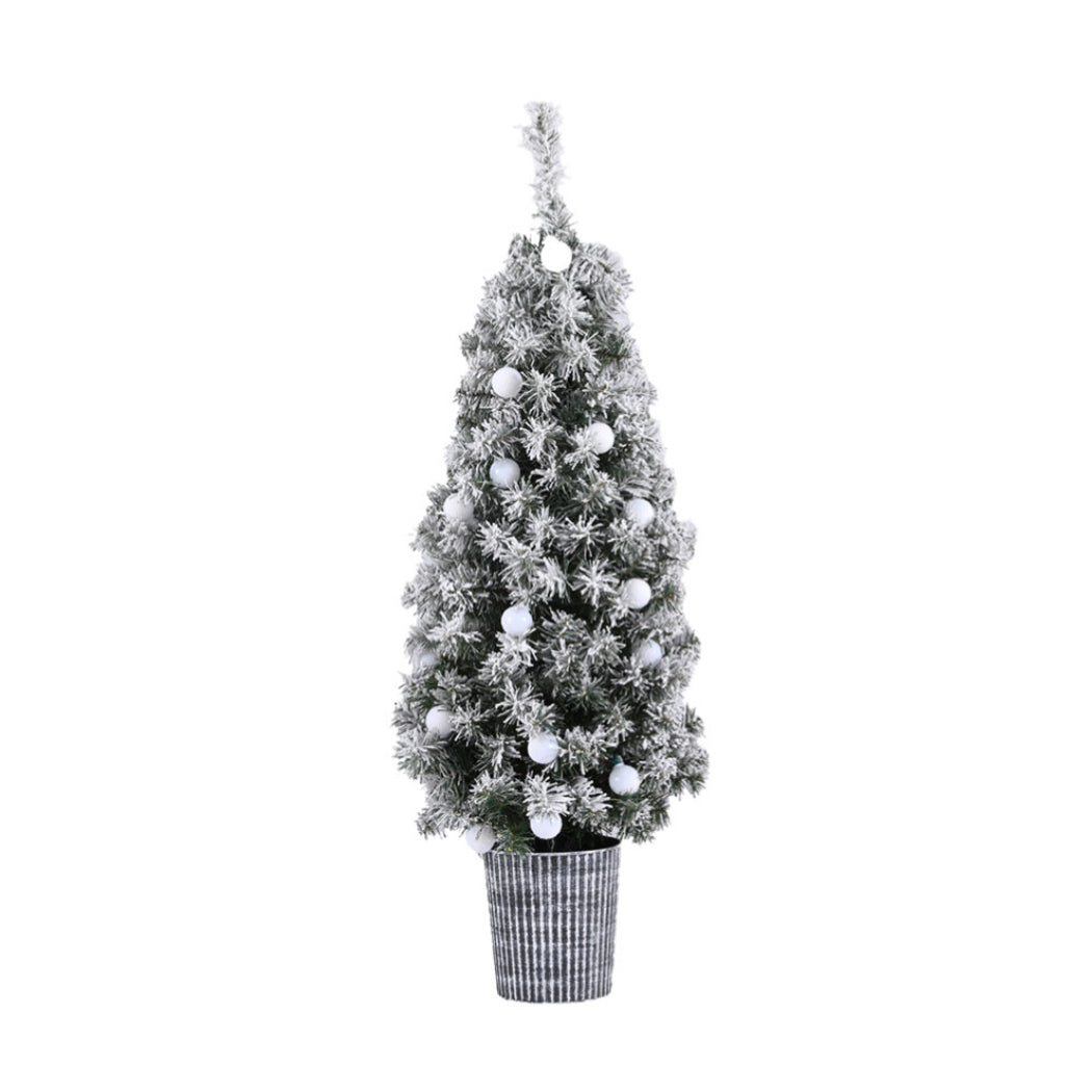 The 1.2m potted snowy tree shown again, needing no tools.