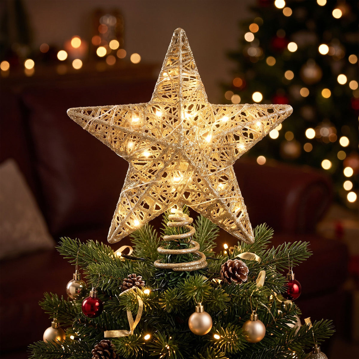 The gold LED star tree topper from another angle, battery operated.