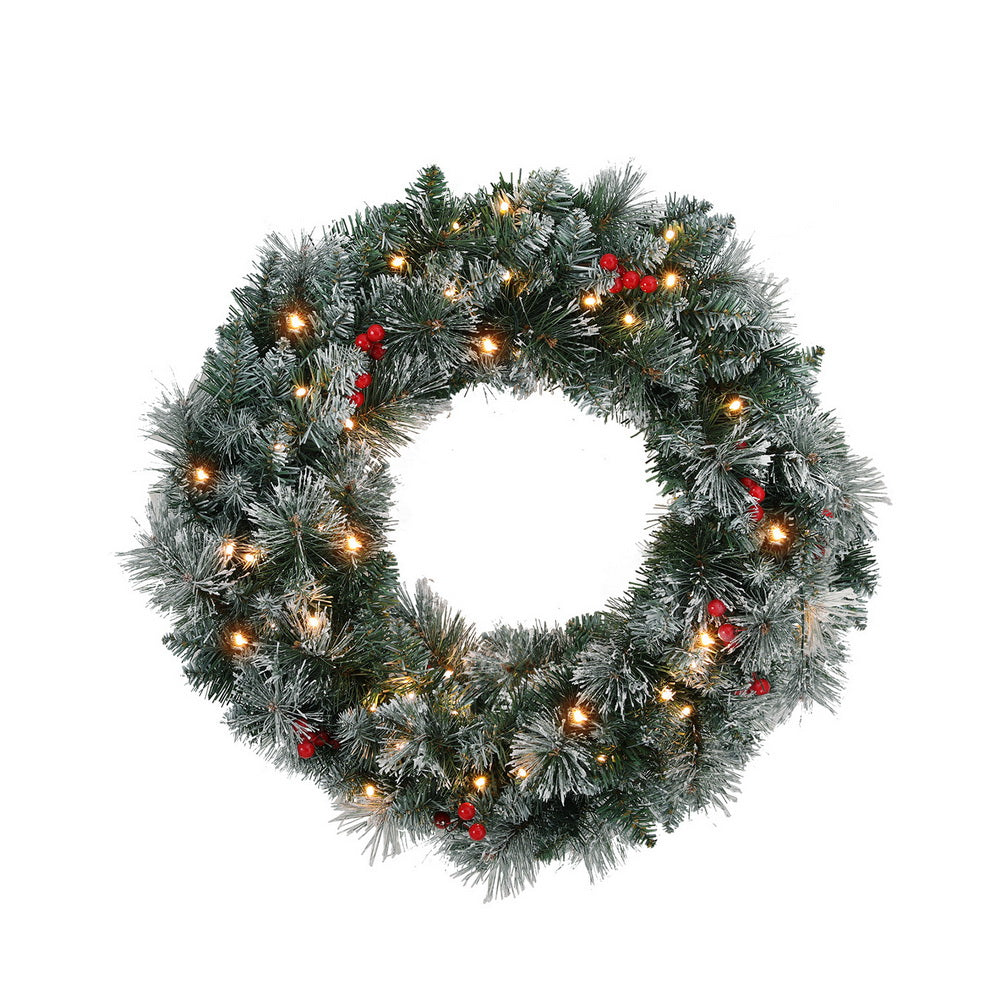 Pre-lit Christmas wreath 60cm across with snow-tipped branches and berries.