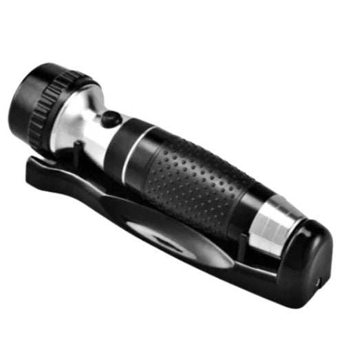 Dolphy emergency torch seated in its black wall-mounted charging bracket