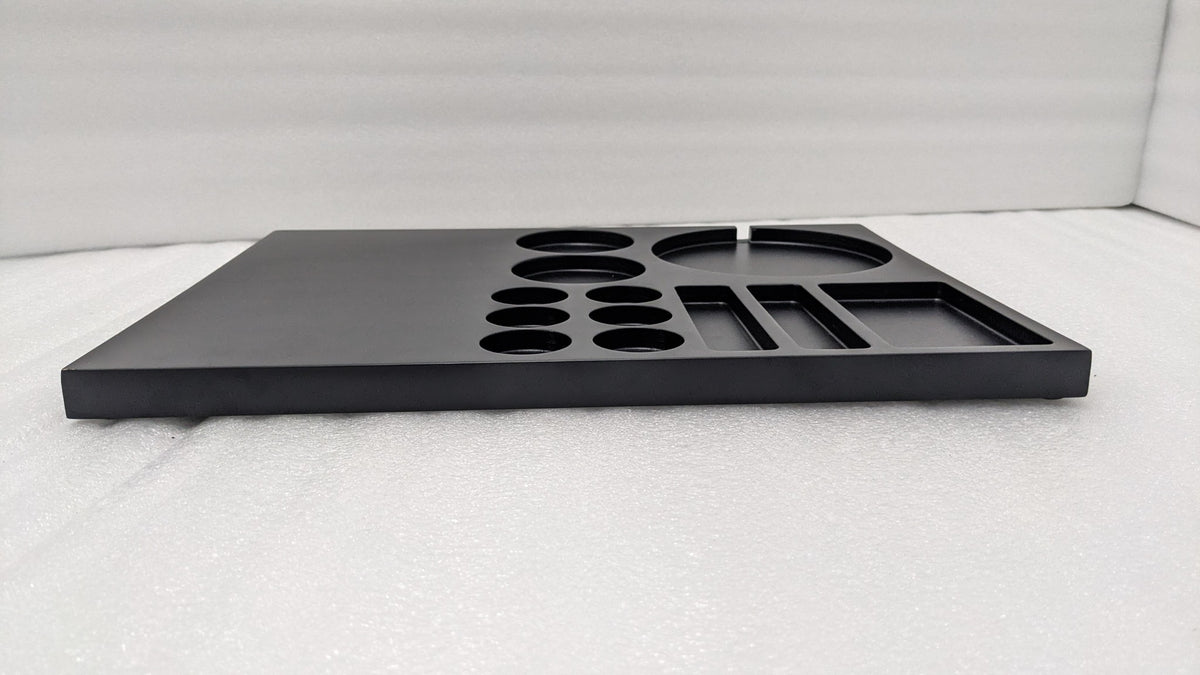 Dolphy black wooden tray side view showing its slim profile