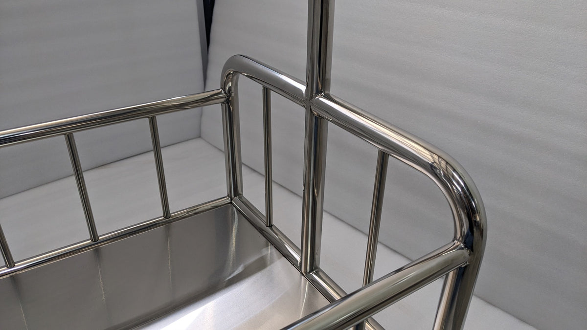 Close-up of the stainless steel rails around the Dolphy laundry cart base