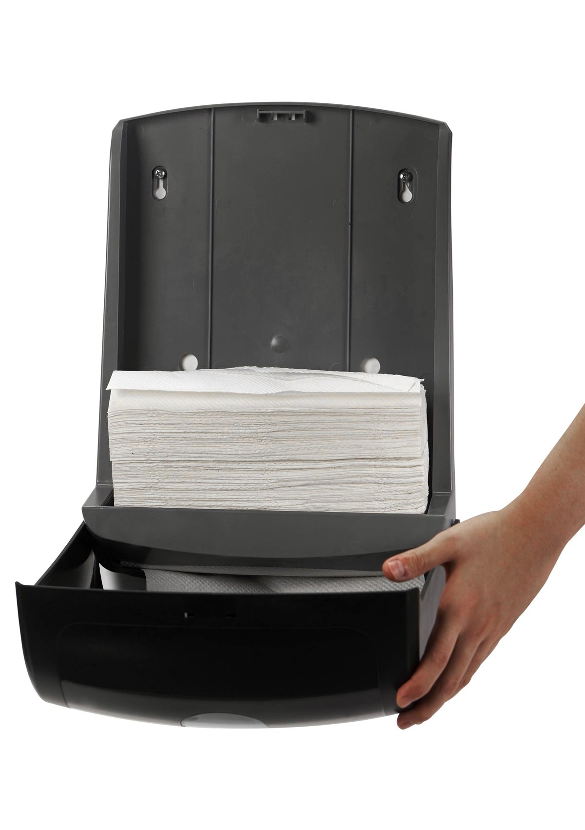 Dolphy black towel dispenser opened, showing a stack of multifold towels inside