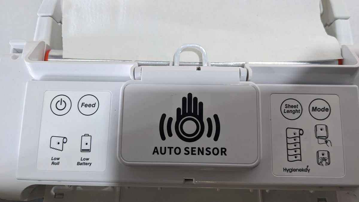Dolphy auto-cut dispenser control panel with auto sensor, feed, sheet length and mode buttons