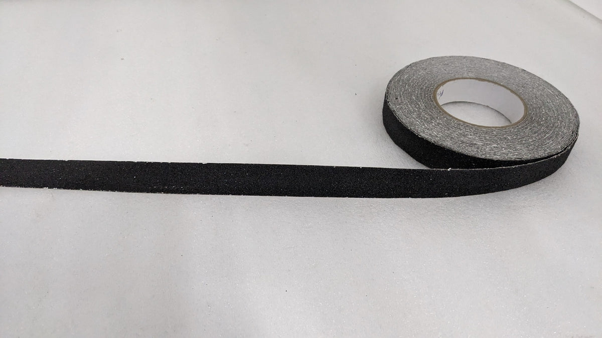 Roll of Dolphy black 25 mm anti-skid safety tape with a length unrolled