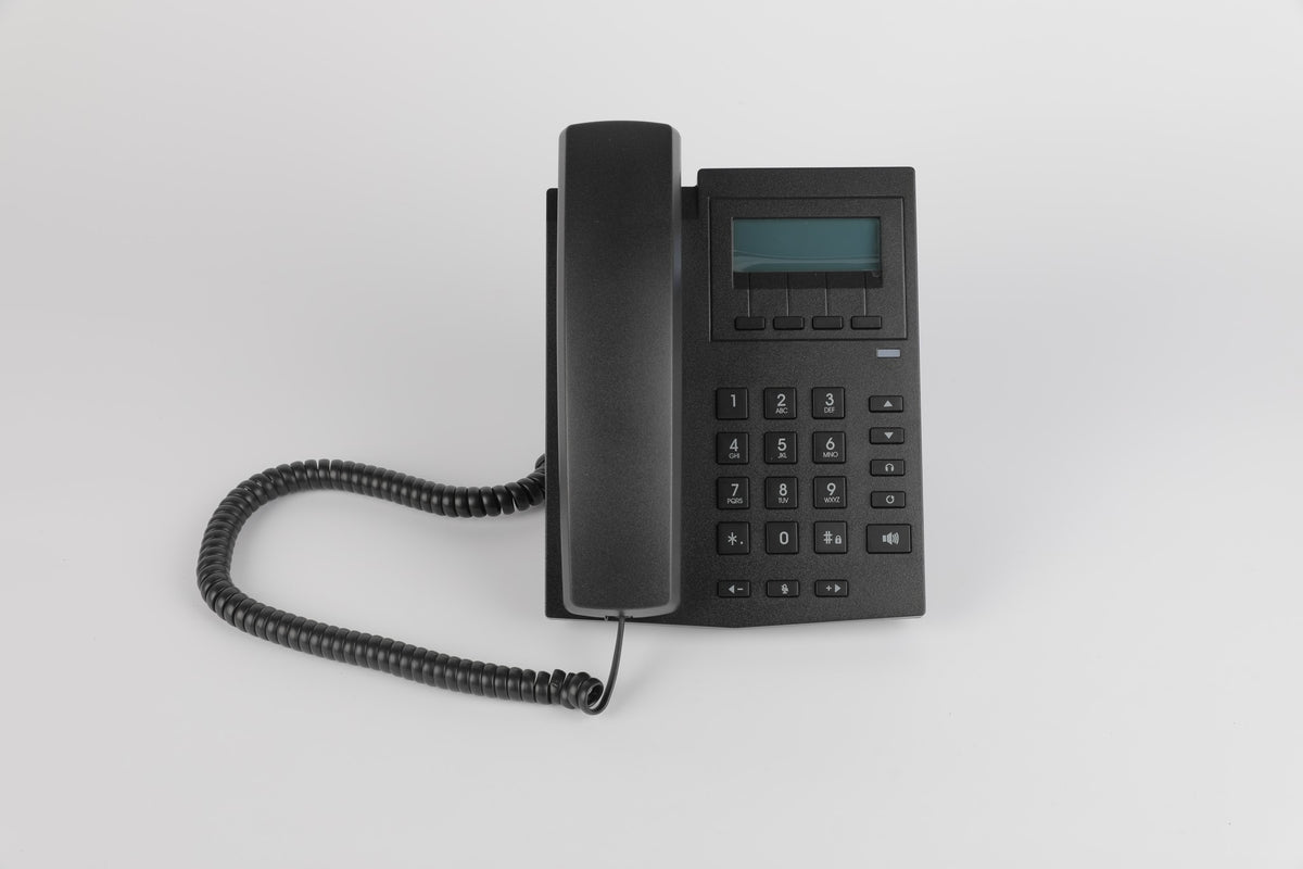 Dolphy black corded desk telephone with LCD display, front view