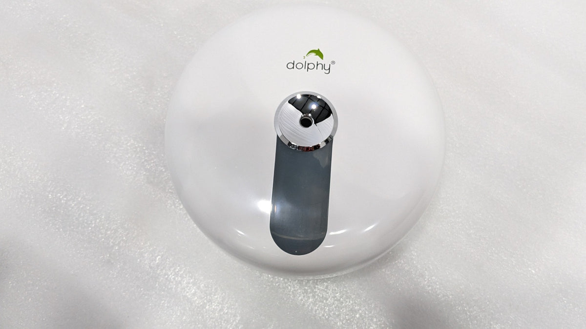 Dolphy white round centre-pull toilet paper dispenser, front view