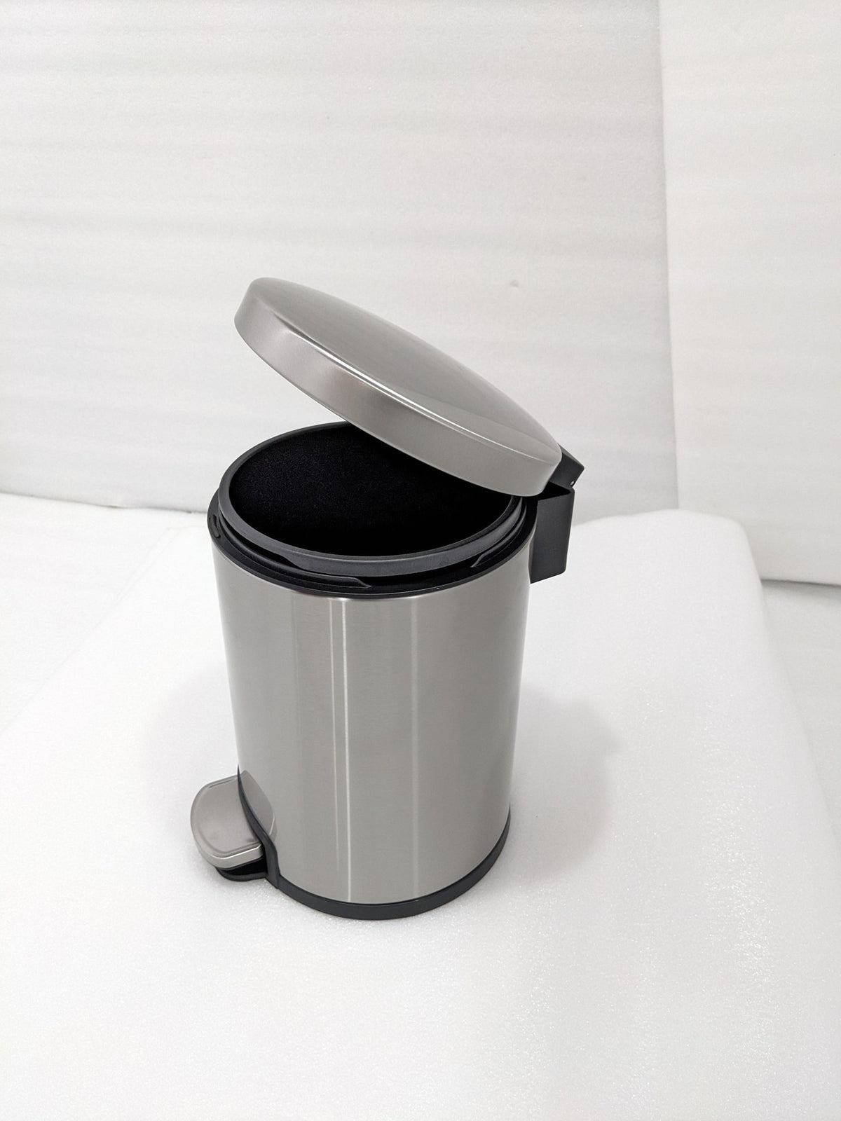 Dolphy 6L stainless steel pedal bin with the soft-close lid raised