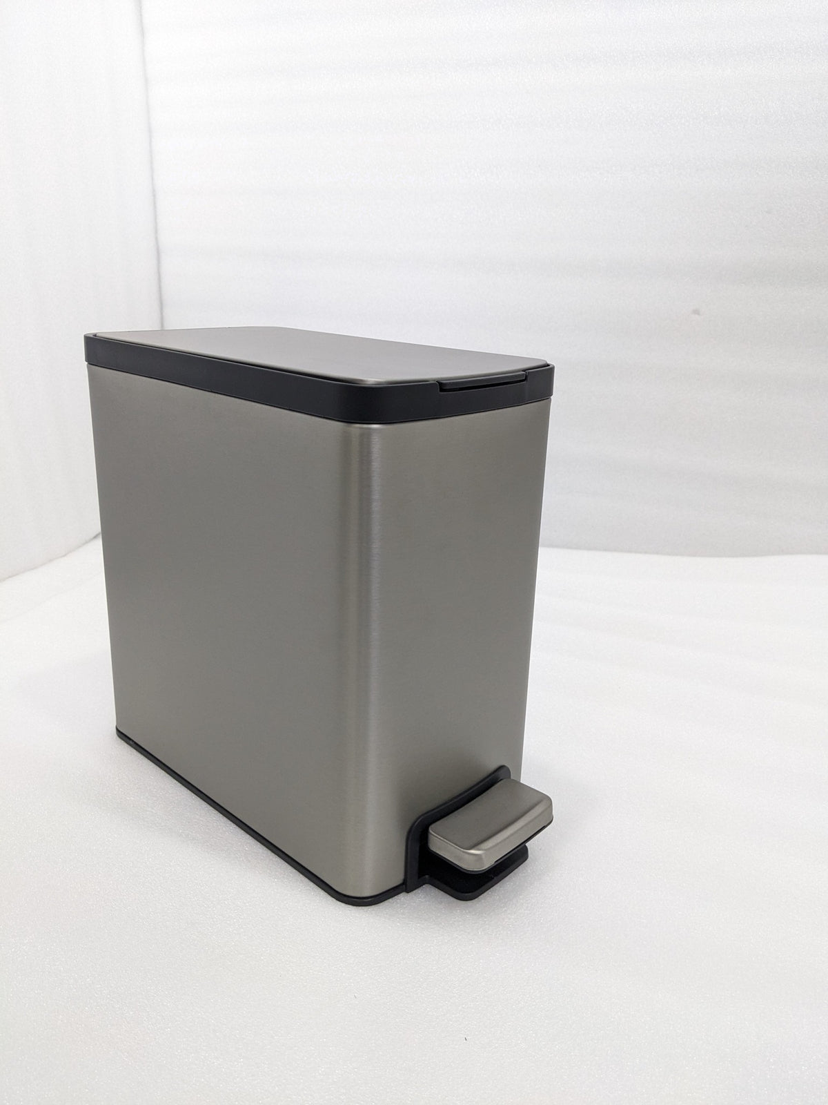 Dolphy 8L slim rectangular stainless steel pedal bin, angled view
