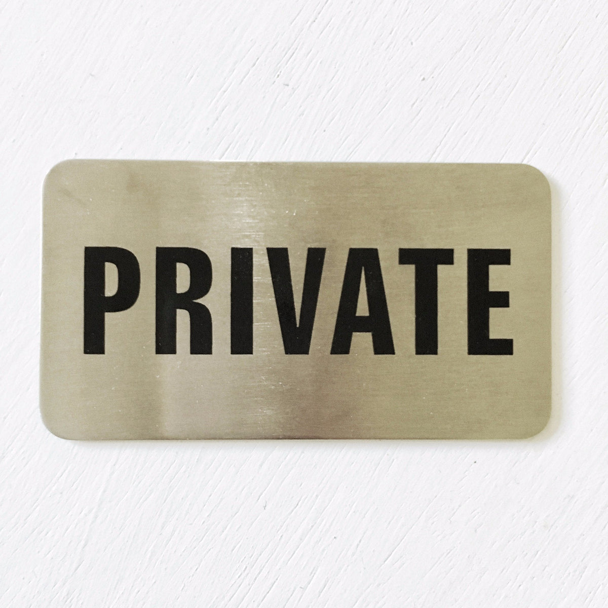 Stainless steel PRIVATE door sign with black lettering
