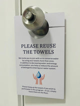 Please Reuse the Towels door hanger hanging on a door handle