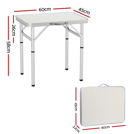 Folding camping table, with a carry handle.
