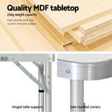 Folding camping table, with a carry handle.