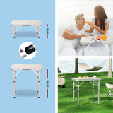 Folding camping table, with a carry handle.