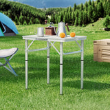 Folding camping table, with a carry handle.