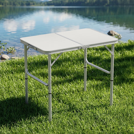 Folding camping table, with a carry handle.