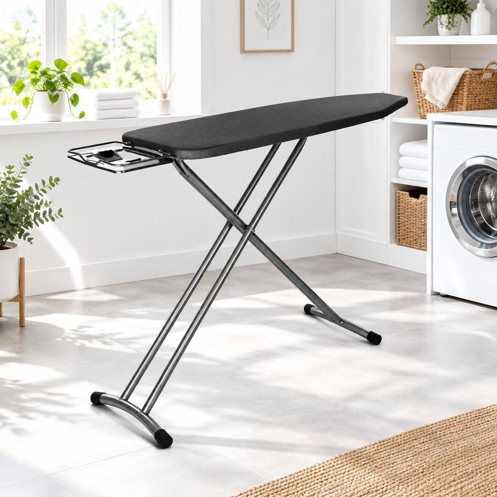 Dolphy folding ironing board, black, in a laundry room
