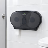 Dolphy twin jumbo toilet roll dispenser, black, in a washroom cubicle