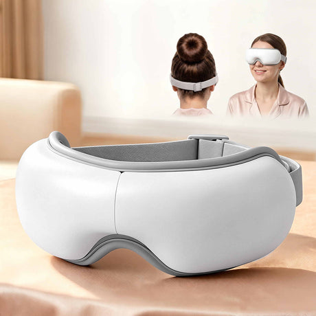 White foldable eye massager, rechargeable.