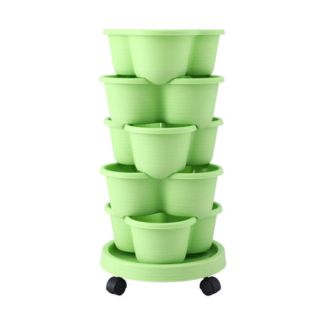 Green Fingers green stackable garden beds.