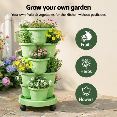 Green Fingers green stackable garden beds.