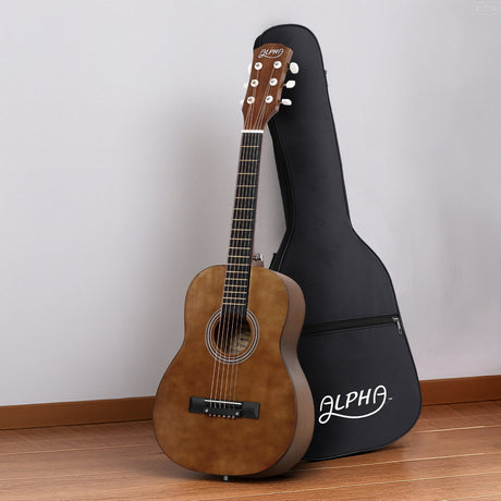 Alpha steel portable string acoustic guitar.