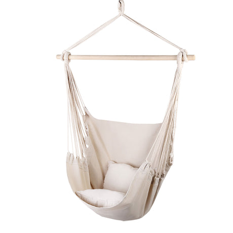 Cream hanging hammocks cushion pillow.
