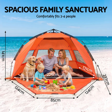 Orange automatic beach tent, lightweight.