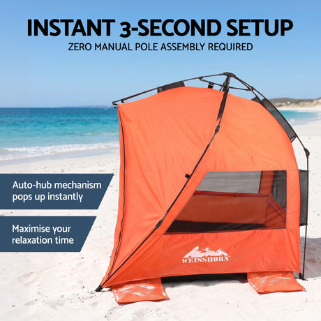 Orange automatic beach tent, supplied with a carry bag.