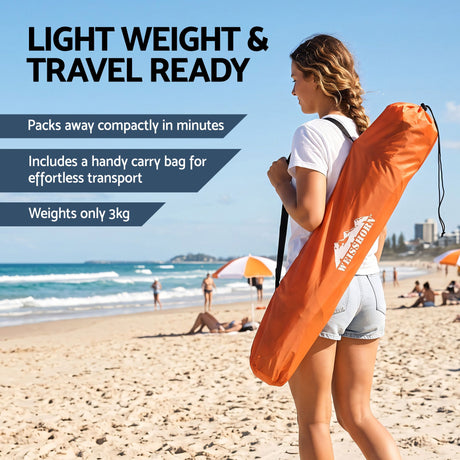 Orange automatic beach tent, supplied with a carry bag.