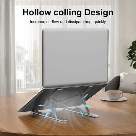 Portable laptop stand, foldable, lightweight.