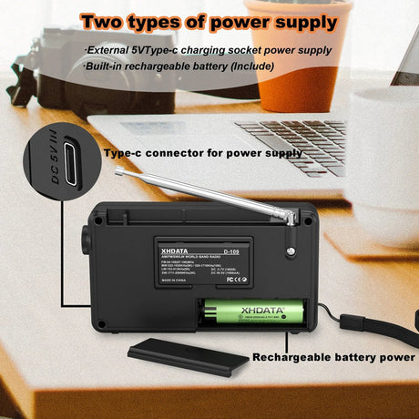 Black portable radio, rechargeable.