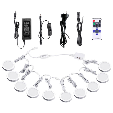 White dimmable puck lights, 12V, operated by remote control.