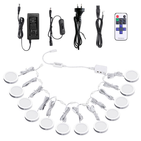 White dimmable puck lights, 12V, operated by remote control.