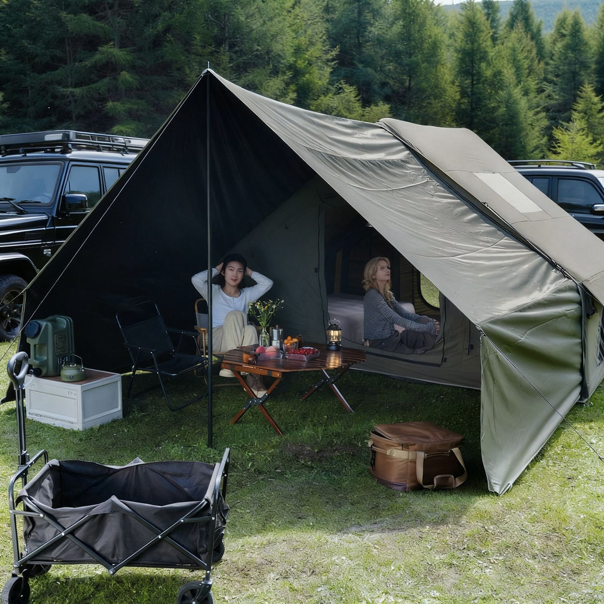 Green inflatable tent, supplied with a carry bag.