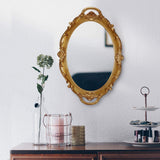 Gold hanging wall mirror, 25 x 38 cm, lightweight.