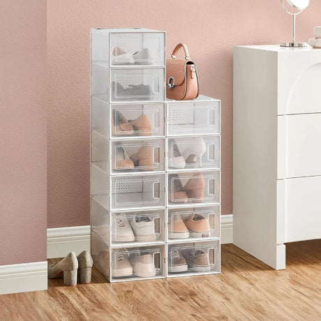 CARLA HOME white stackable storage boxes.