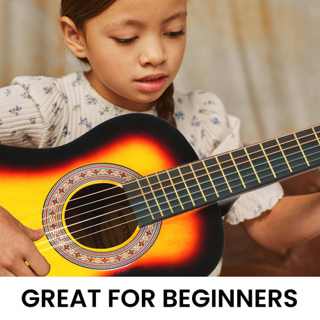 Wooden childrens guitar, supplied with a carry bag.