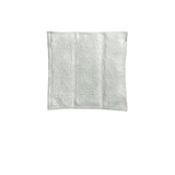 Beige embossed cushion cover.