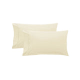 Cream cotton pillowcases.