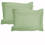 Accessorize green pillowcases, queen size.
