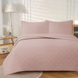 Blush reversible coverlet, queen size, reversible, so either side can face up.