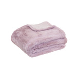 Lilac faux fur throw.