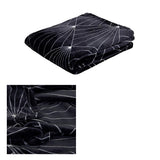 Black flannel throw rug.