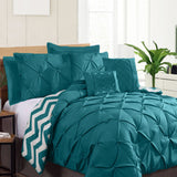 Ramesses teal comforter, 7 piece, queen size.